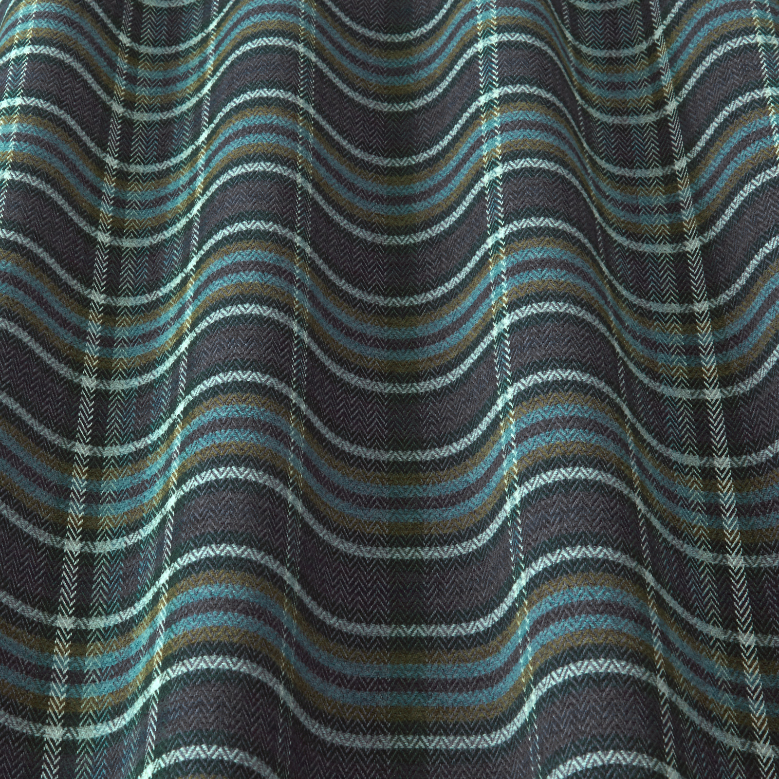 Dark indigo woven fabric with teal wave stripes and herringbone texture