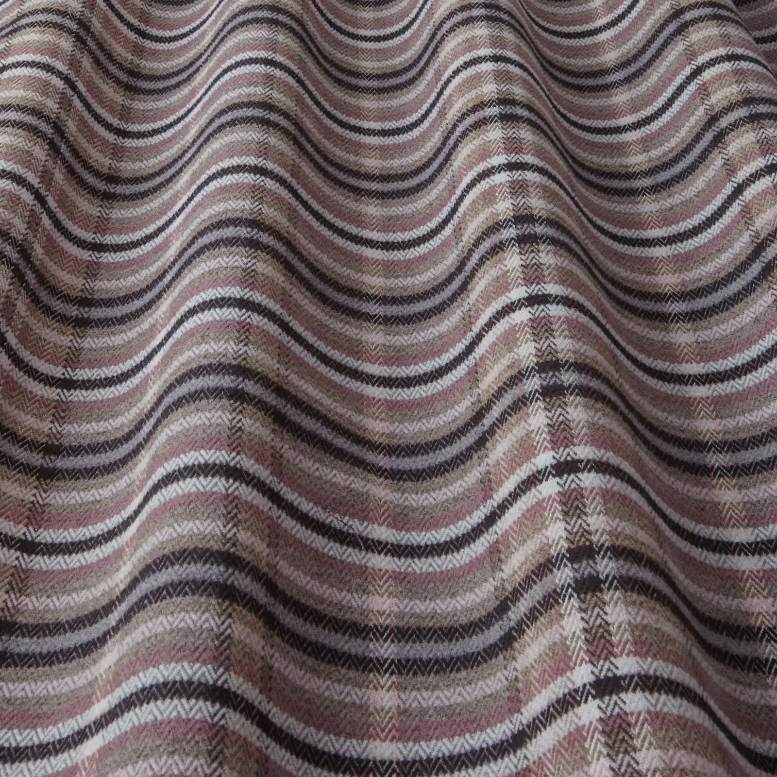 Wavy striped fabric swatch in taupe, grey, black and dusty rose