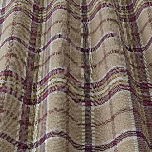 Beige tartan fabric with mulberry, olive and brown check lines on a softly folded swatch