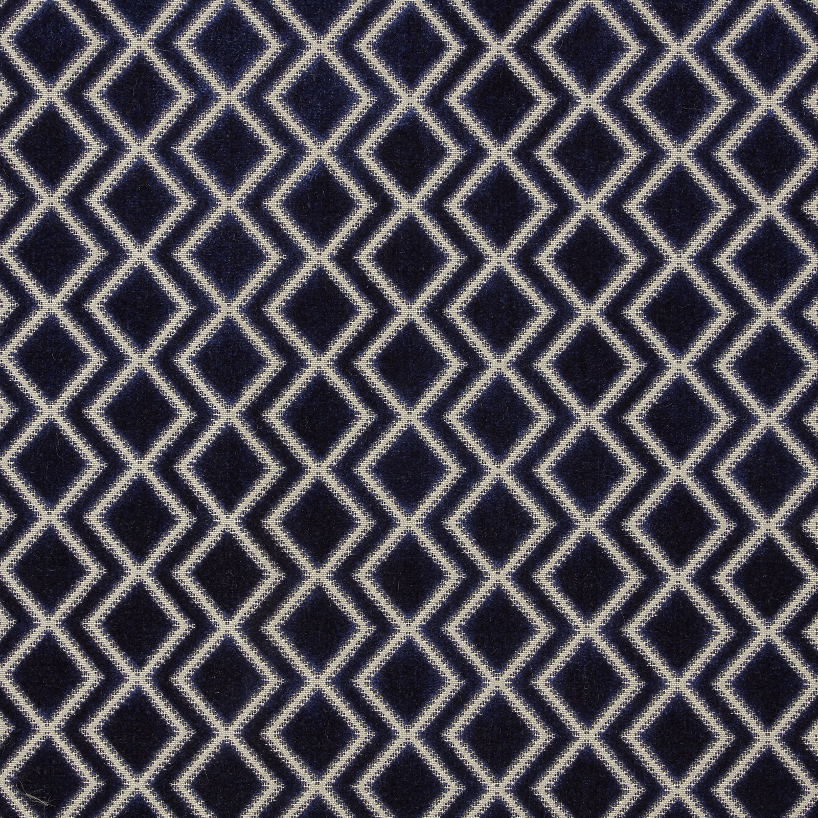 Deep midnight blue velvet with pale diamond lattice geometric pattern