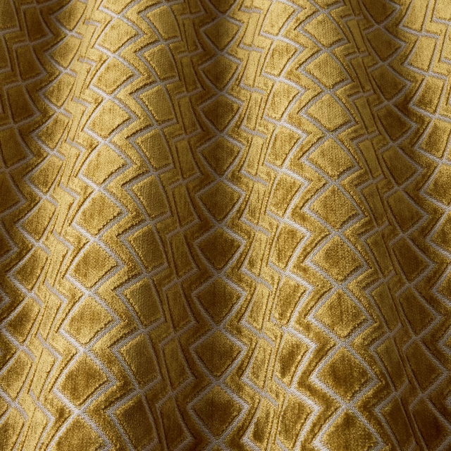 Golden saffron velvet with raised wavy geometric pattern and soft sheen