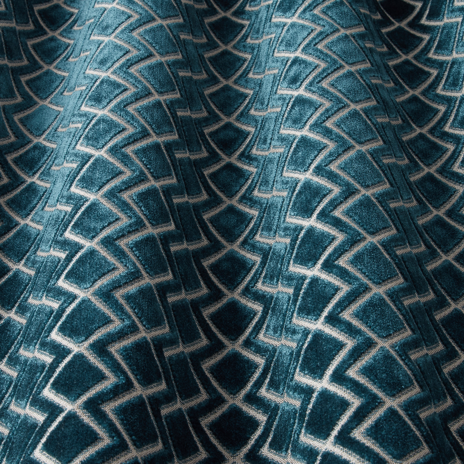 Deep teal velvet with scalloped geometric arches and pale linear outlines