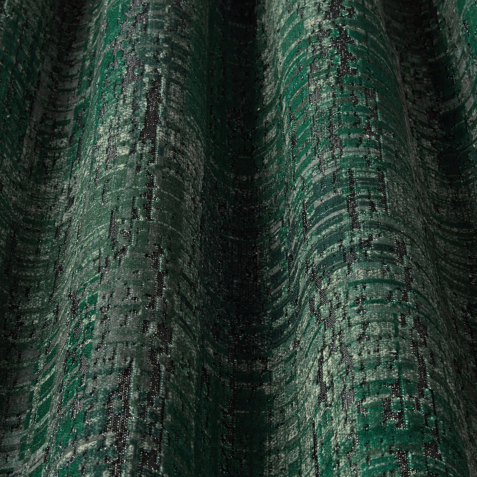Deep teal velvet swatch with wavy strié pattern and dark shadowed texture