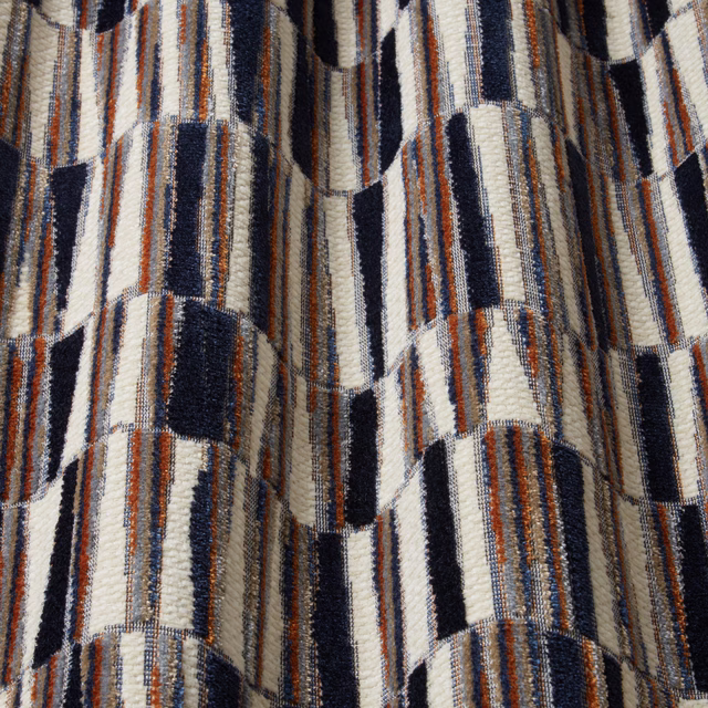 Close-up of navy, ivory and rust wavy velvet stripes with textured pile