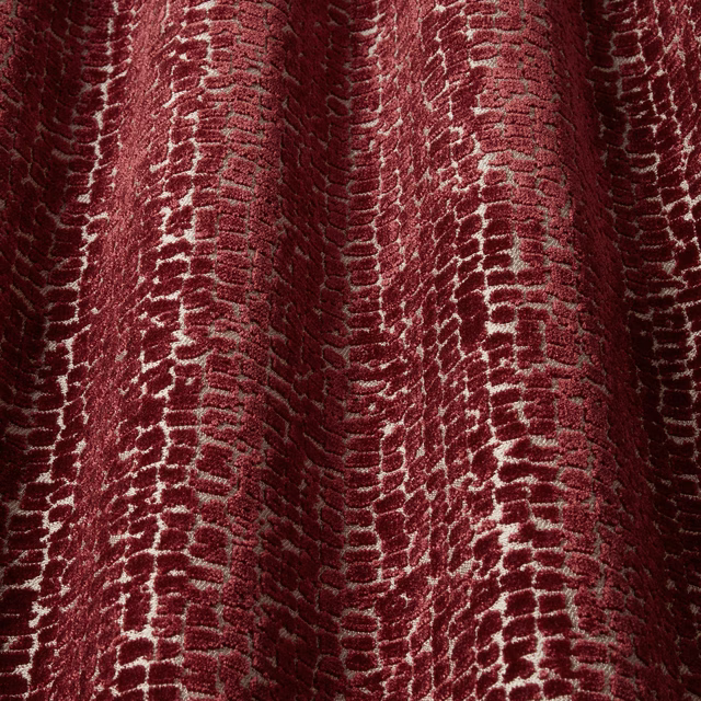 Deep claret velvet with a wavy cracked abstract texture and soft sheen
