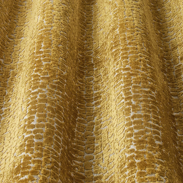 Saffron gold velvet with wavy raised texture and soft sheen