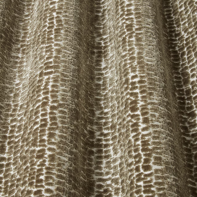 Taupe-brown velvet swatch with wavy abstract pile pattern