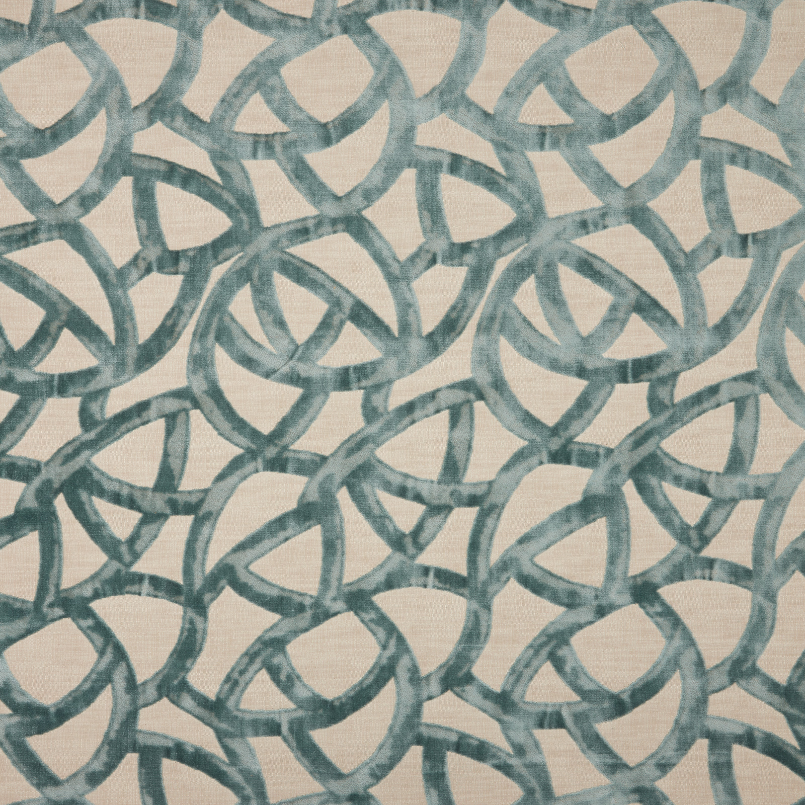 Azure blue overlapping ring velvet pattern on a pale cream ground