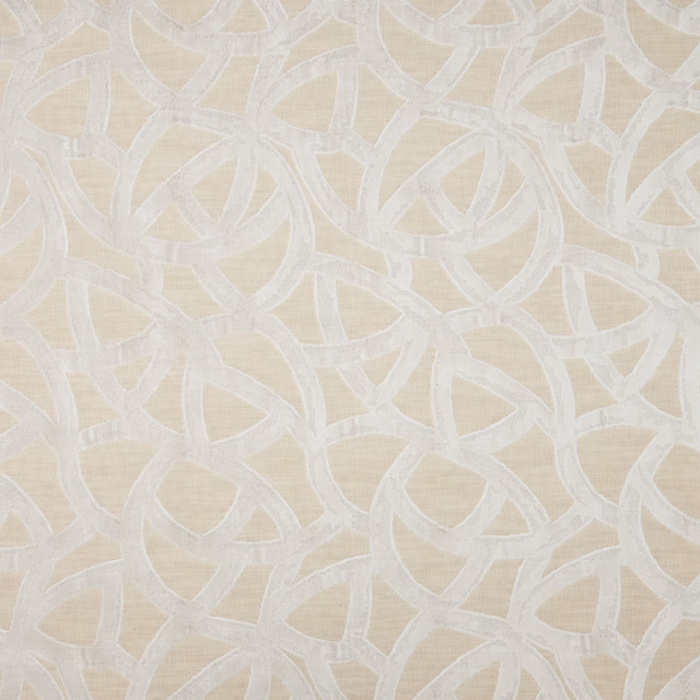 Cream velvet fabric with interlocking ivory loop pattern and soft sheen