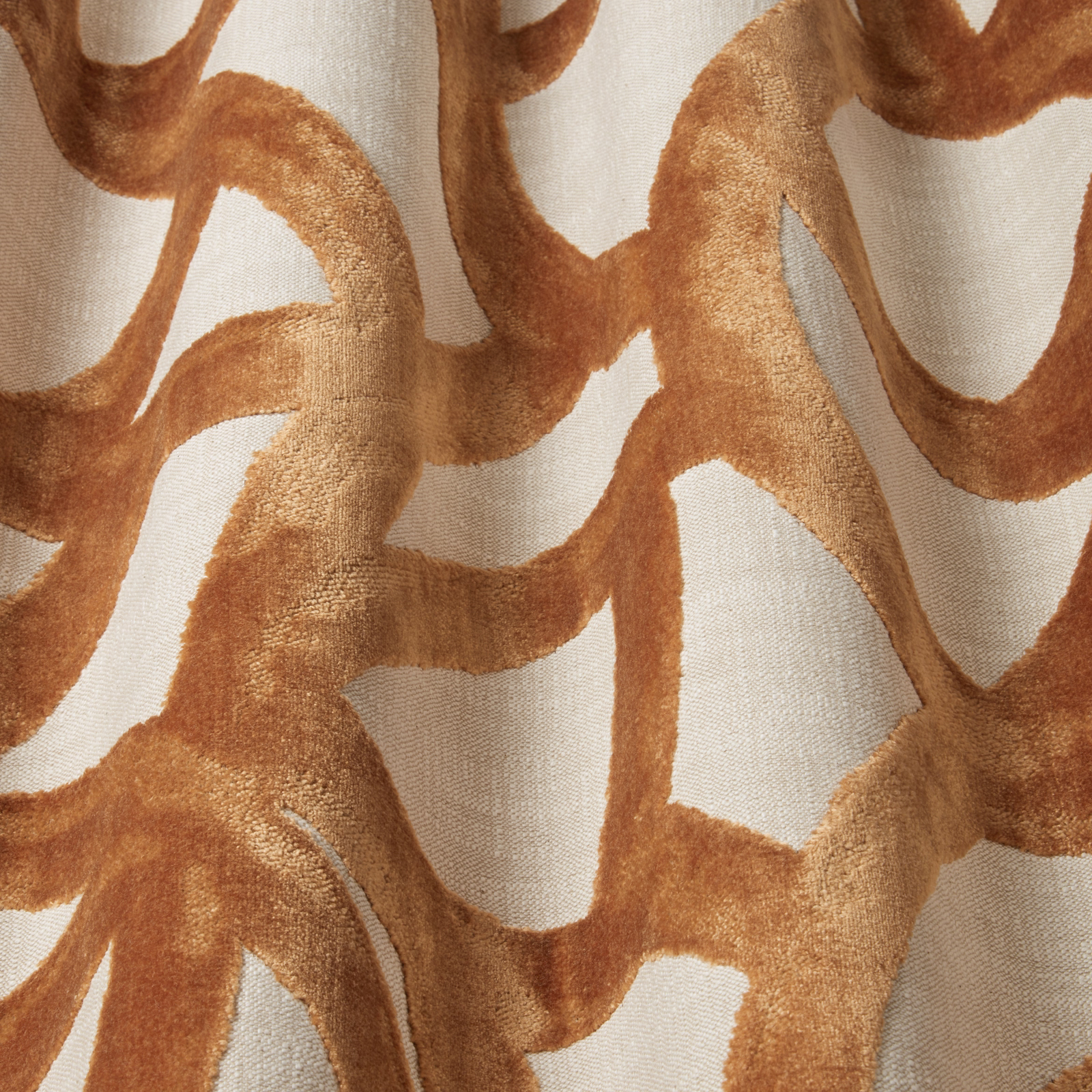 Sienna wavy velvet loops on a pale ground, with a soft lustre