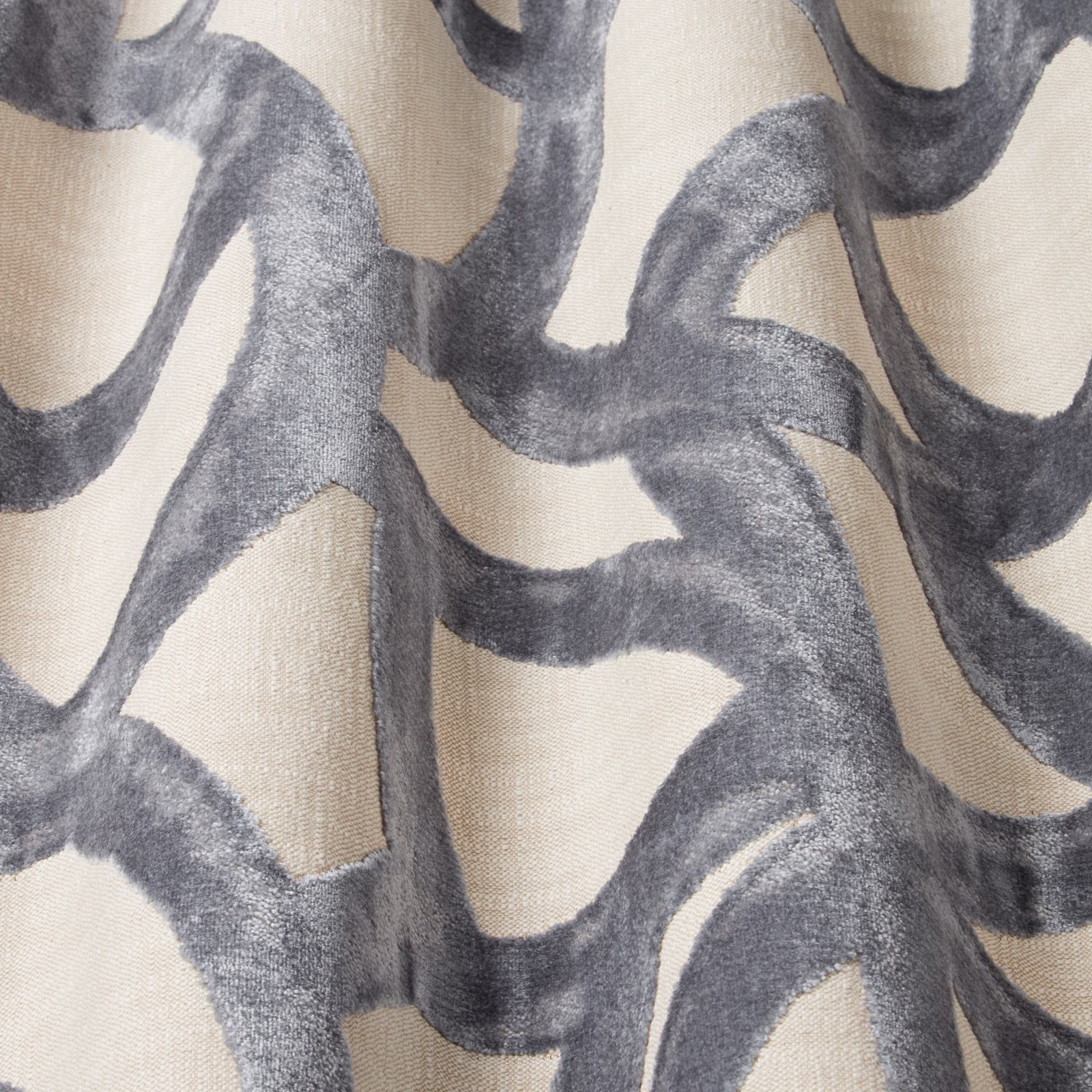 Slate blue-grey wavy velvet pattern on a pale ivory ground