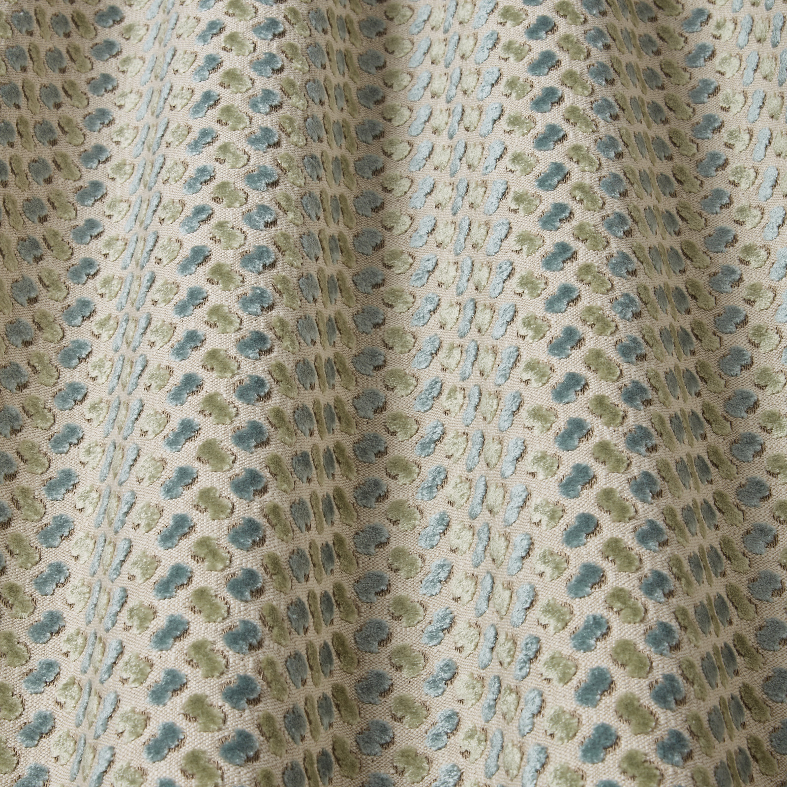 Soft azure and sage abstract velvet with flowing dotted wave pattern