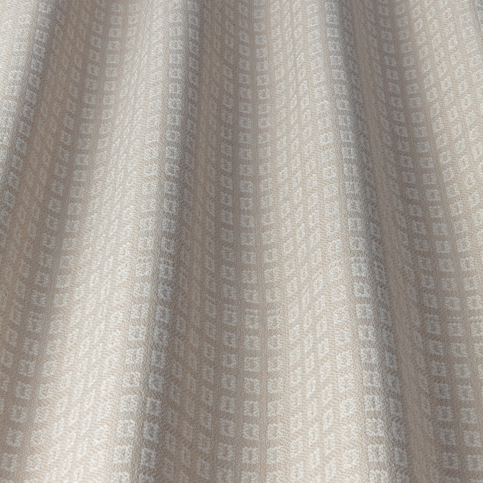 Soft ivory woven fabric with tiny tonal square geometric repeat
