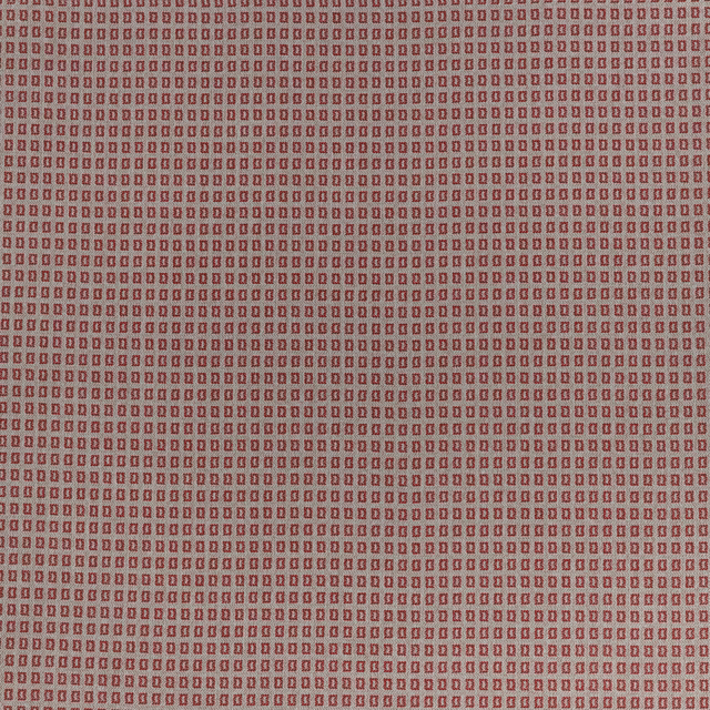 Close-up of ruby red small geometric woven fabric with tiny rectangular repeat
