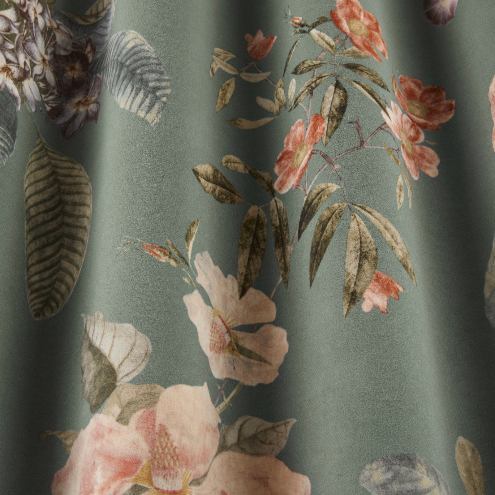 Sage green botanical fabric with blush flowers and layered leafy stems
