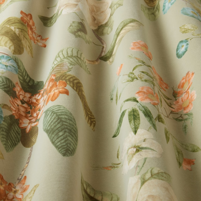 Pistachio botanical fabric with trailing leaves and coral flowers