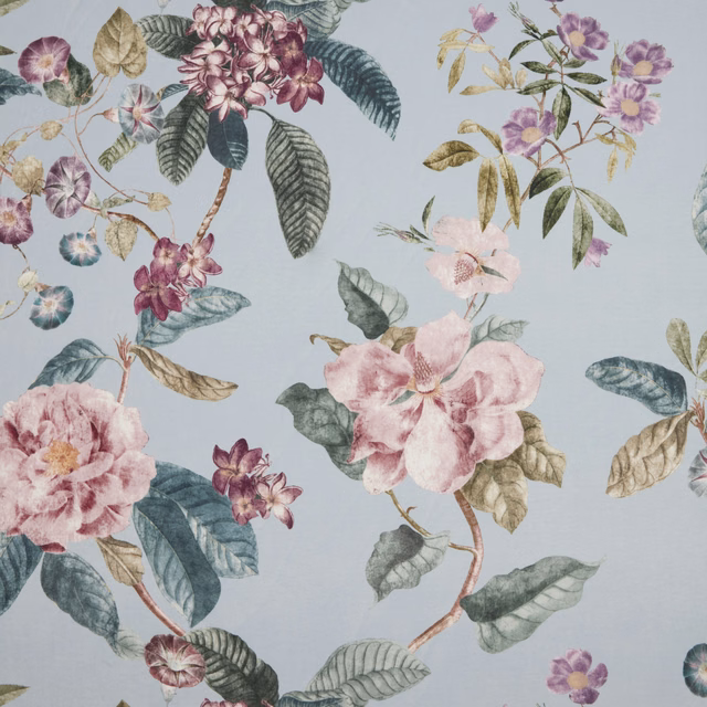 Watercolour botanical fabric with pink flowers and sage leaves on a sky-blue ground