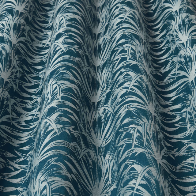 Teal and ivory botanical weave with large flowing leaf pattern