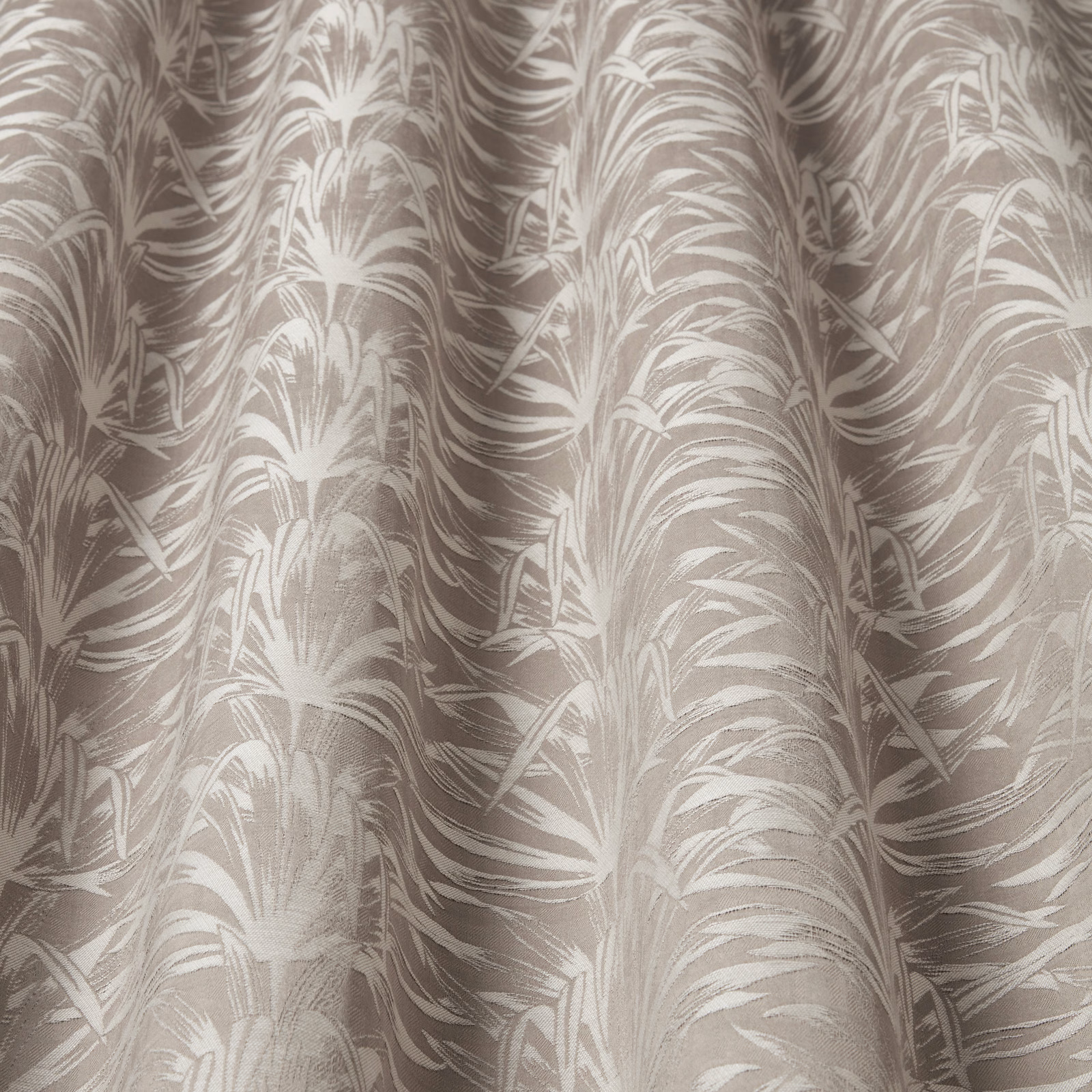 Taupe and cream wavy leaf-pattern fabric swatch with soft sheen