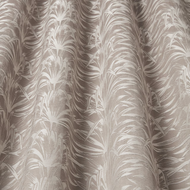 Taupe and cream wavy leaf-pattern fabric swatch with soft sheen