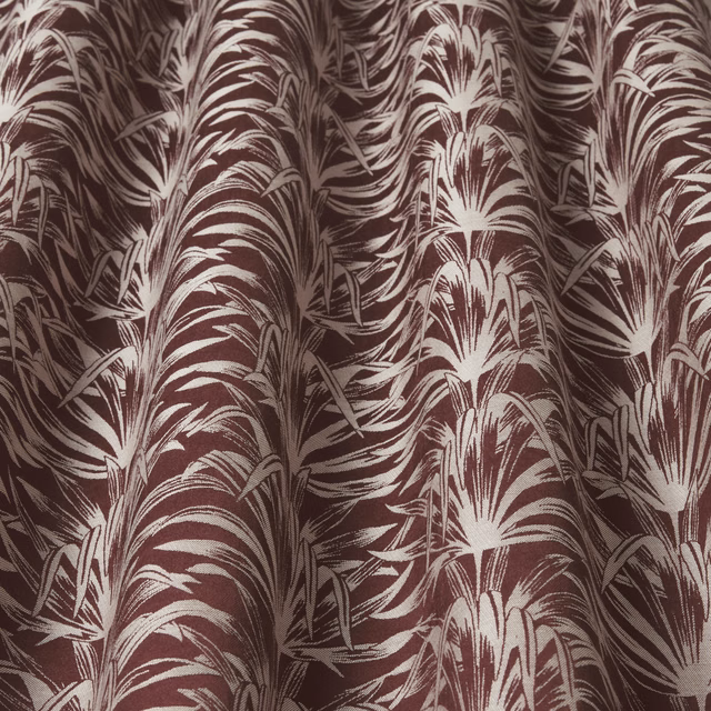 Damson and ivory wavy botanical print fabric with a glossy woven look