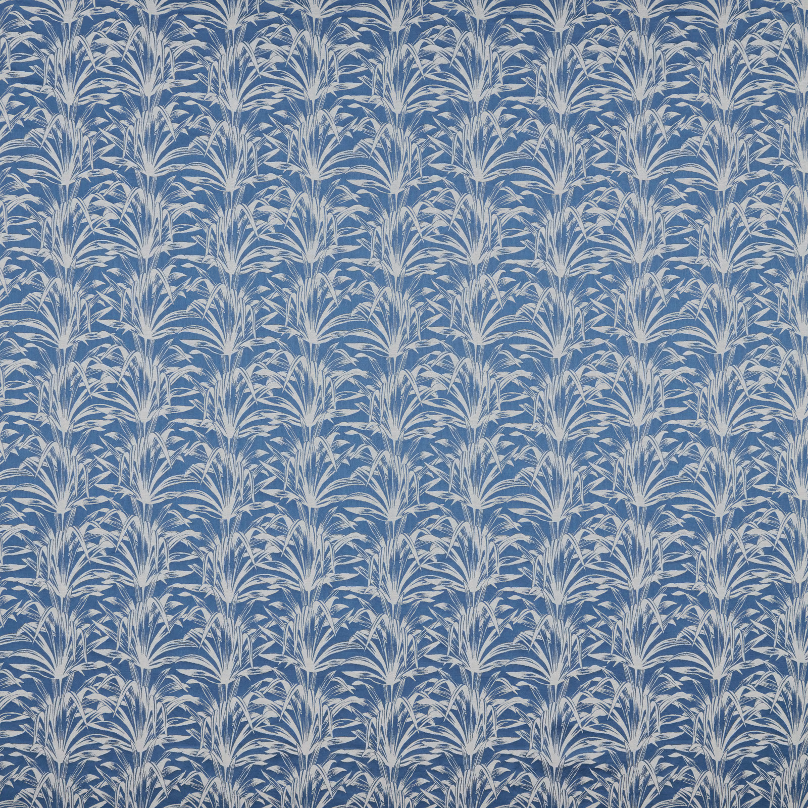 Blue and ivory botanical repeat fabric with crisp palm-like leaves