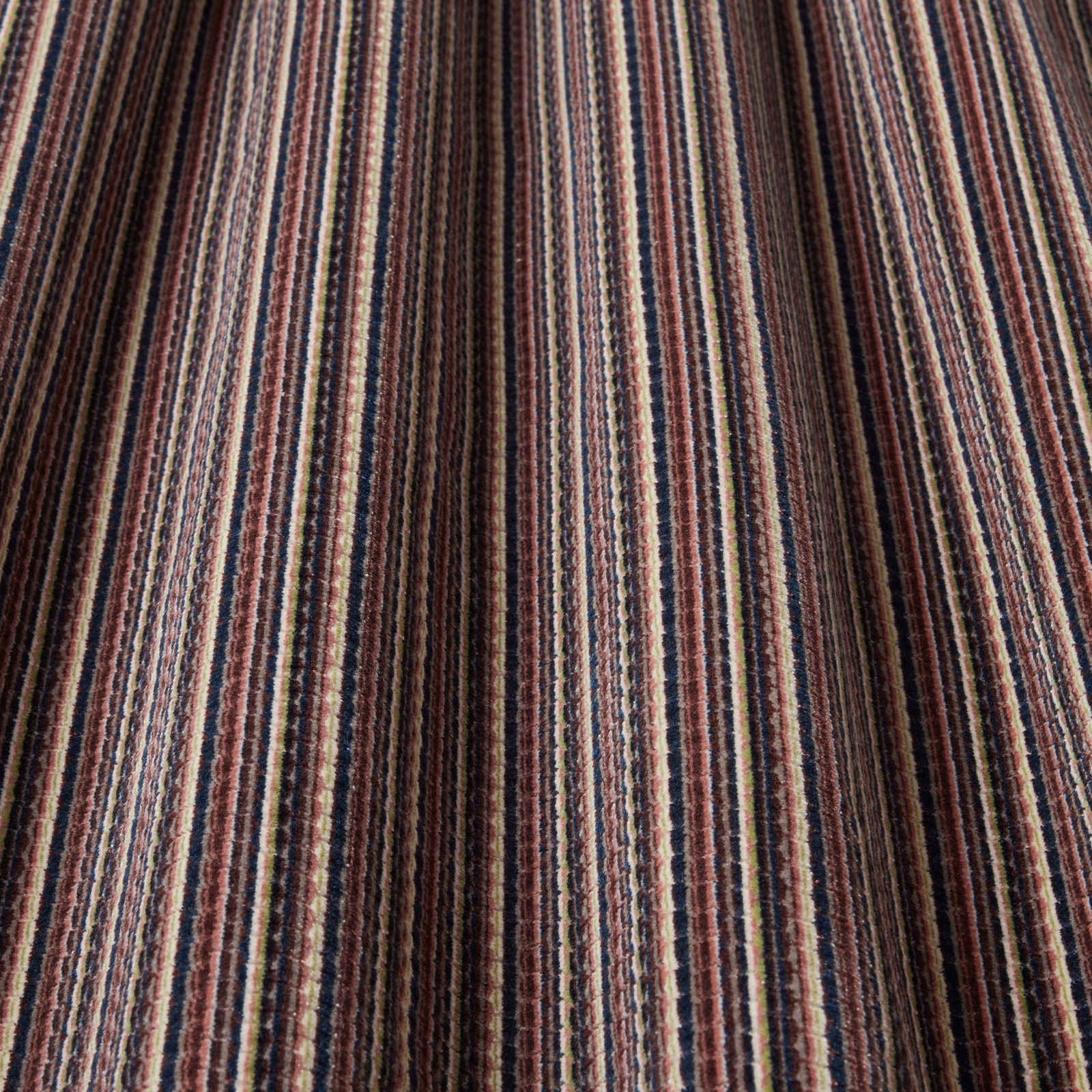 Vertical bilberry, plum and cream striped woven fabric with a textured finish