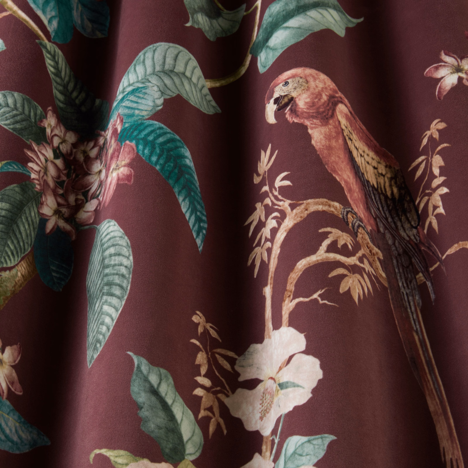 Damson plum botanical fabric with parrot, leaves and cream flowers