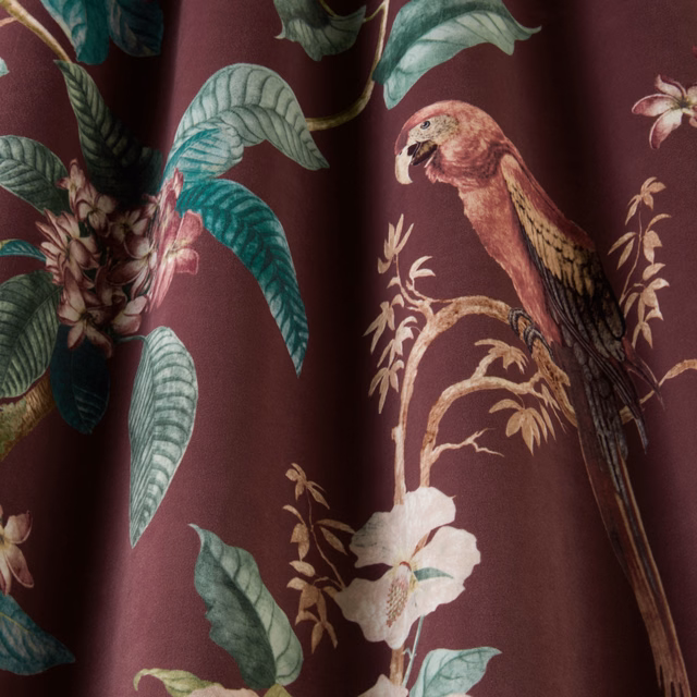 Damson plum botanical fabric with parrot, leaves and cream flowers