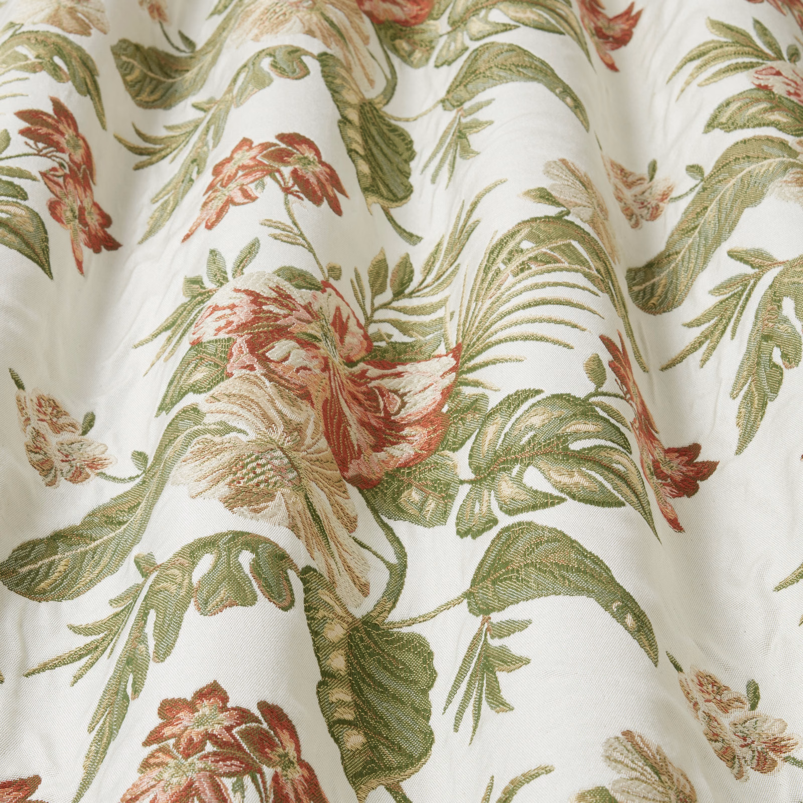 Pistachio green botanical fabric with blush and terracotta flowers on ivory