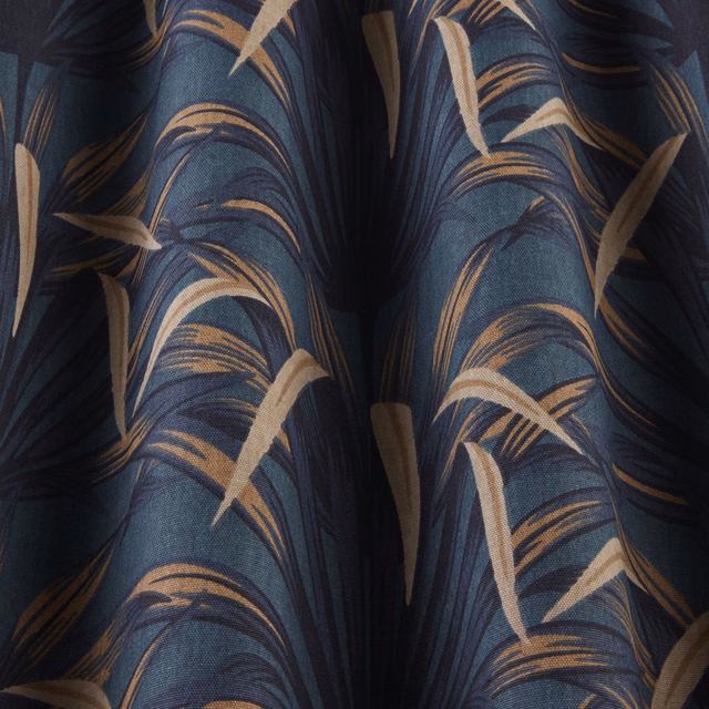 Deep teal fabric with sweeping beige leaf-like waves and dark striping