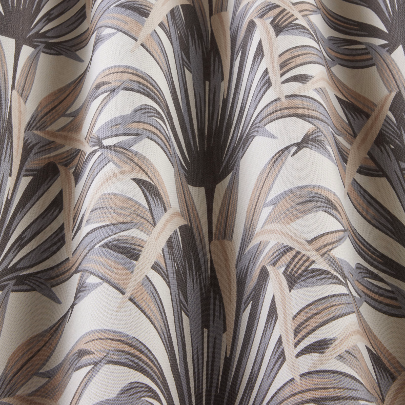 Cream fabric with large wavy palm motif in taupe, grey and charcoal