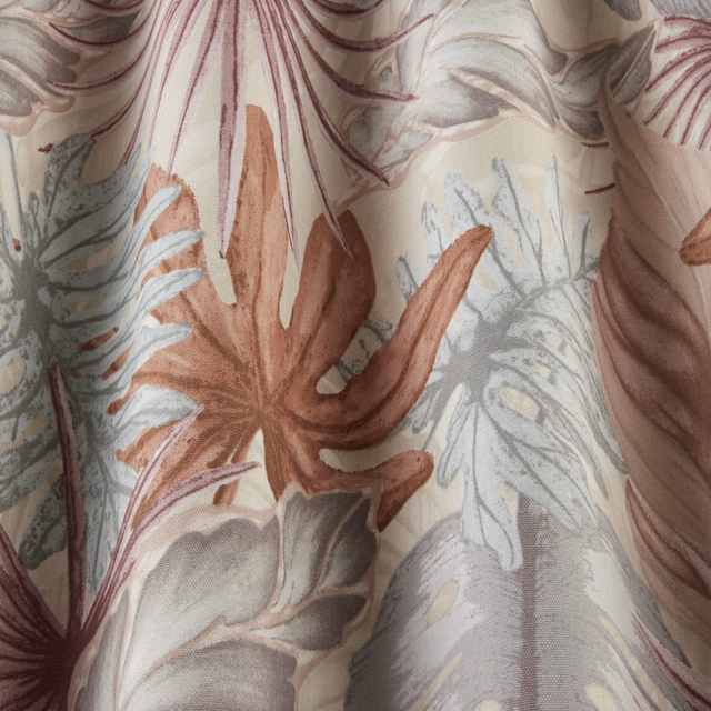 Pale botanical fabric with dusty rose leaves and misty grey-green foliage