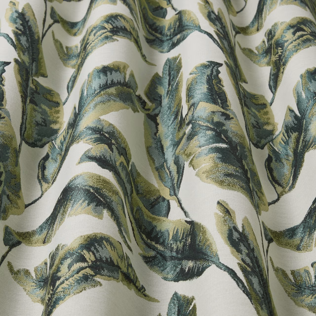 Large leafy botanical print in forest green, teal and olive on ivory fabric