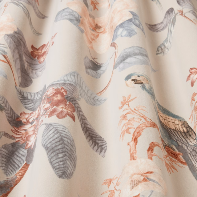 Parchment cream fabric with painterly birds, leaves and flowing stems in soft grey and blush