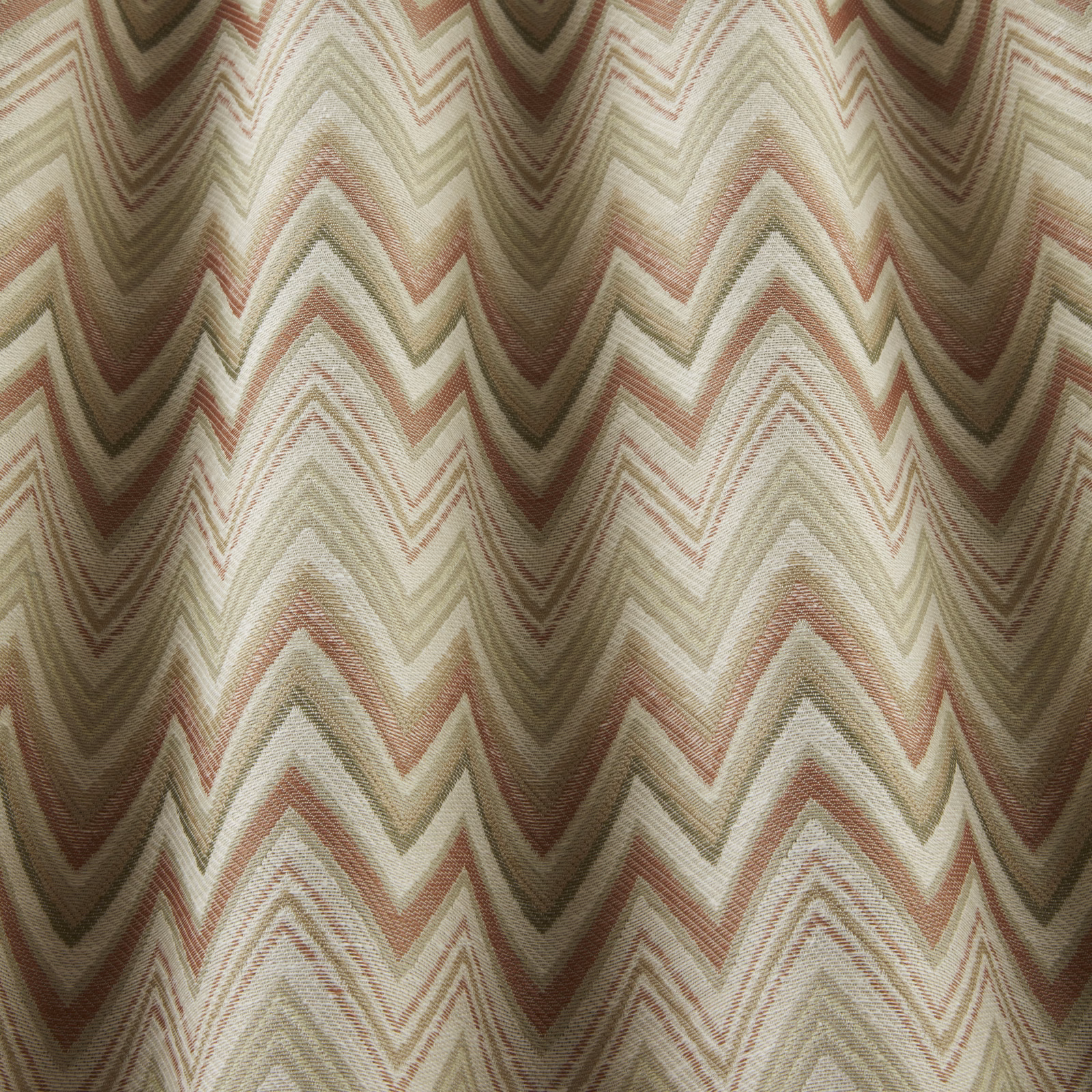 Papaya coral and olive wavy zigzag woven fabric with cream ground