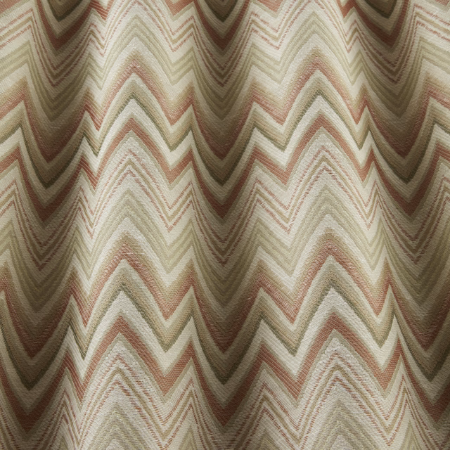 Papaya coral and olive wavy zigzag woven fabric with cream ground