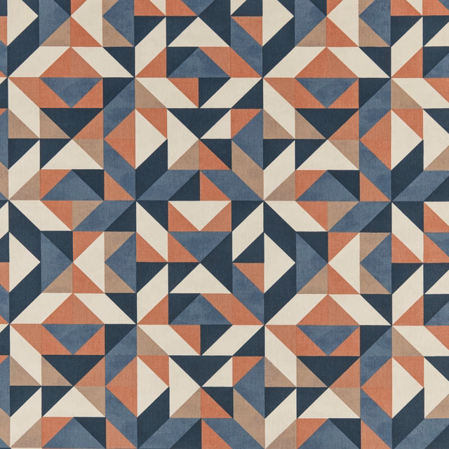 Geometric fabric swatch in navy, terracotta, cream and taupe triangles