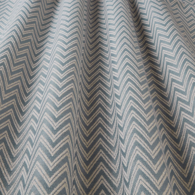 Soft eau de nil chevron fabric with pale ivory zigzag stripes and woven texture