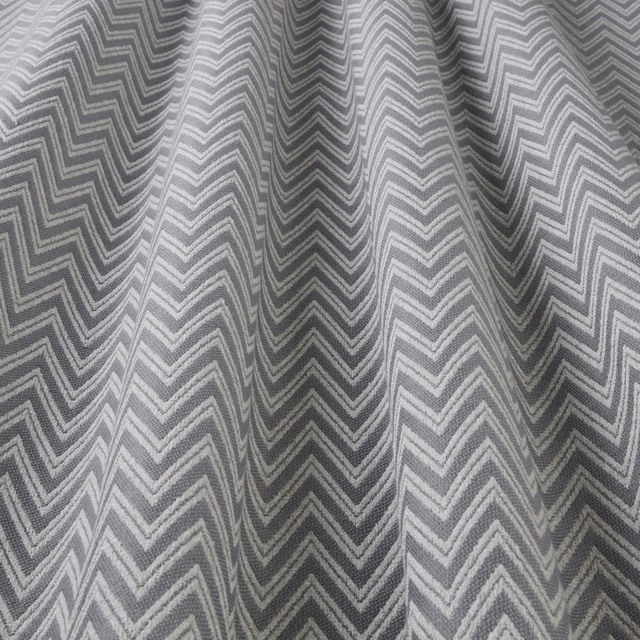 Grey zigzag woven fabric with cool silver and charcoal chevrons