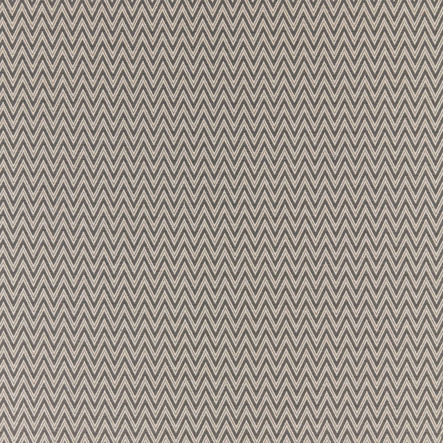 Small grey chevron textile with pale zigzag outlines and flat weave texture