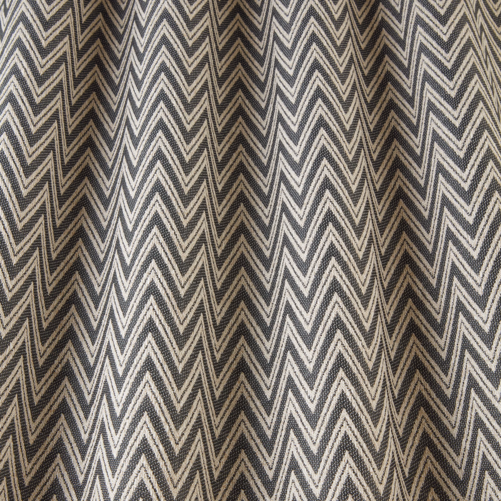 Charcoal and ivory chevron woven fabric with a bold zigzag pattern