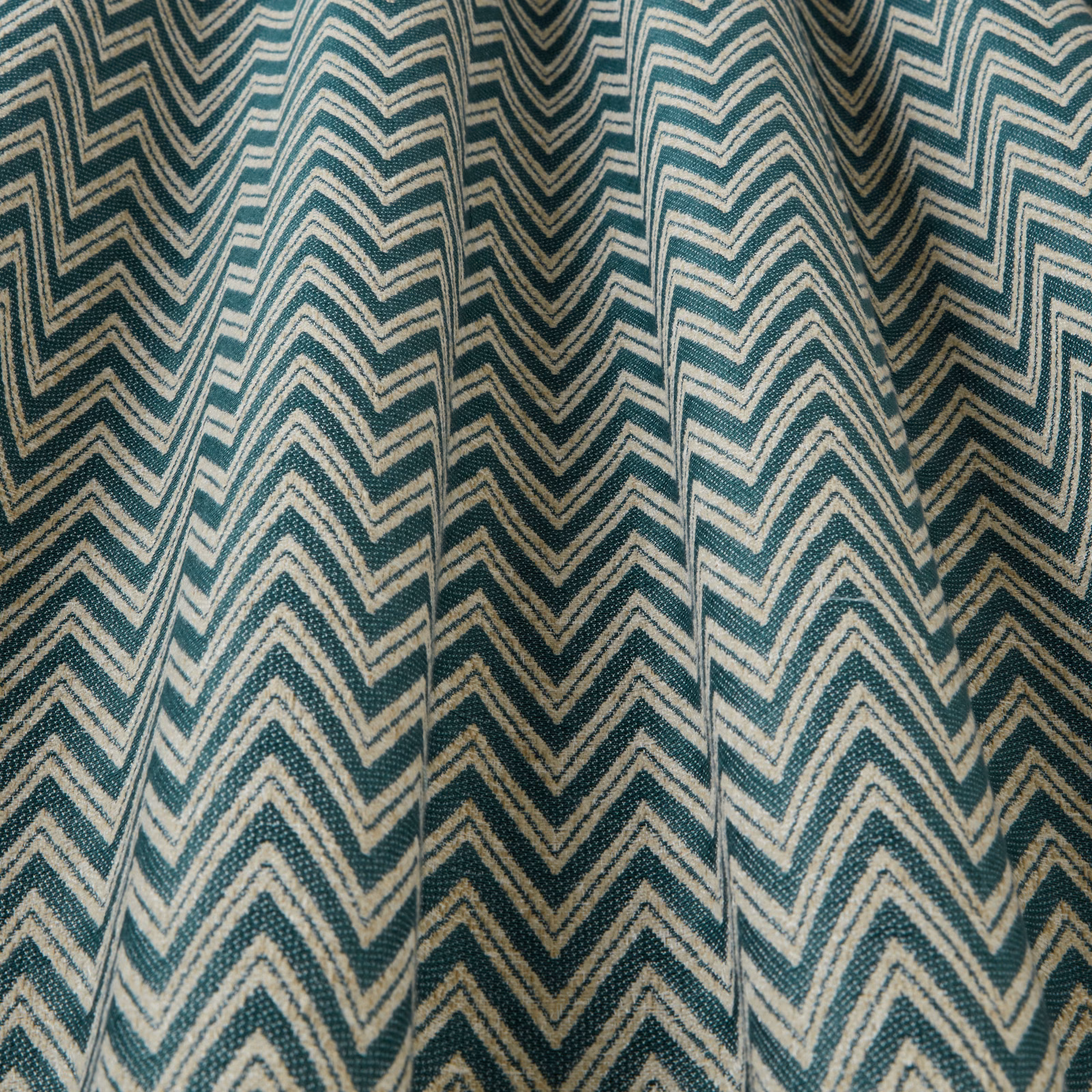 Teal and cream zigzag woven fabric with a large chevron pattern
