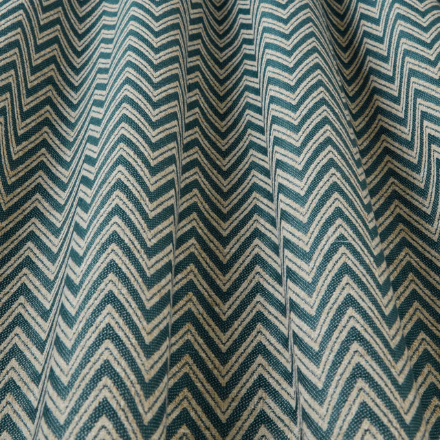 Teal and cream zigzag woven fabric with a large chevron pattern
