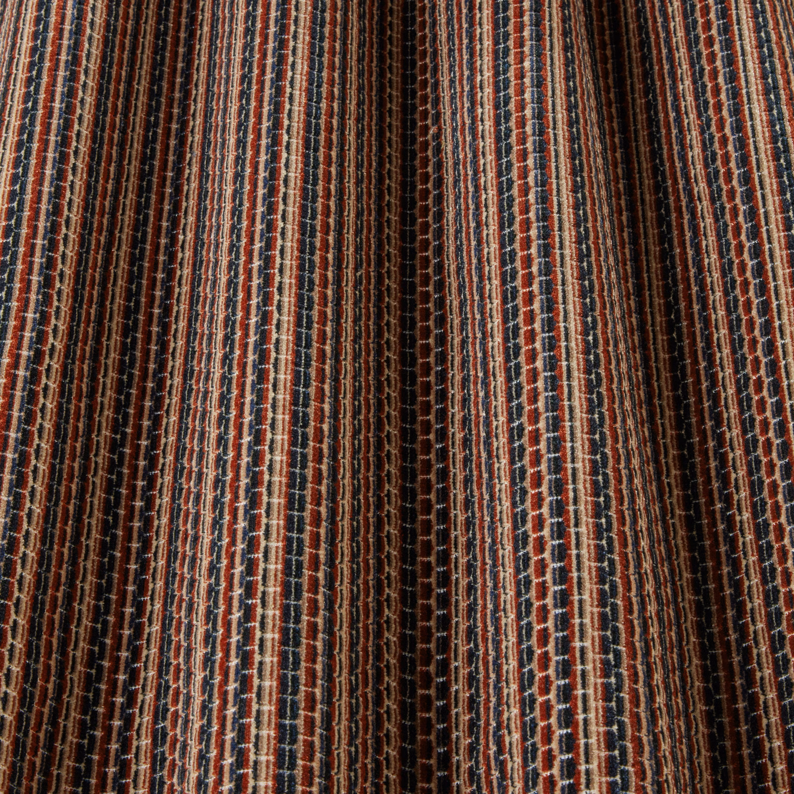 Textured woven stripe fabric in terracotta, cream, navy and dark brown