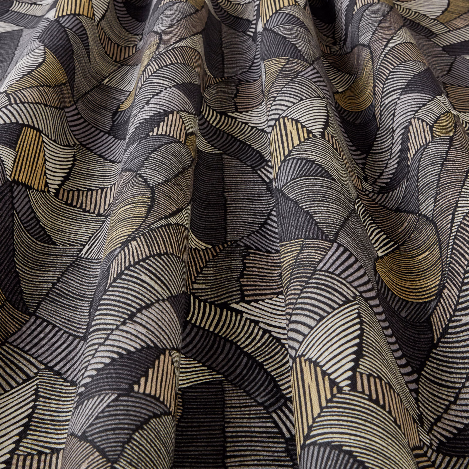 Black and gold wavy geometric fabric with layered striped arcs