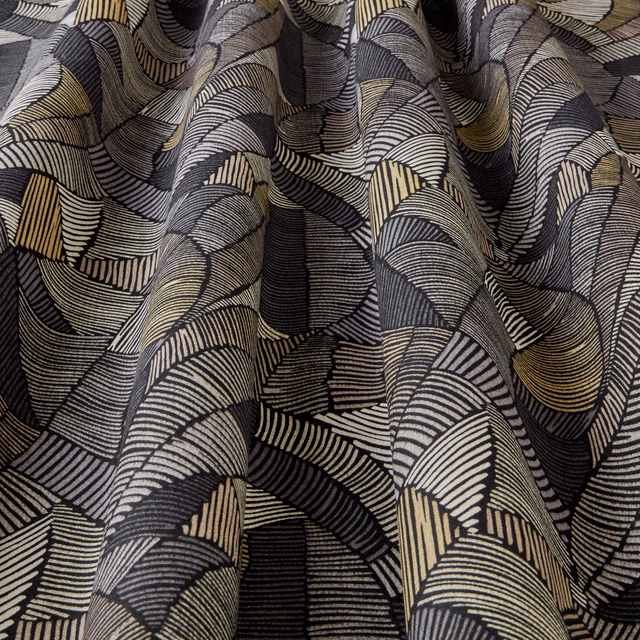 Black and gold wavy geometric fabric with layered striped arcs