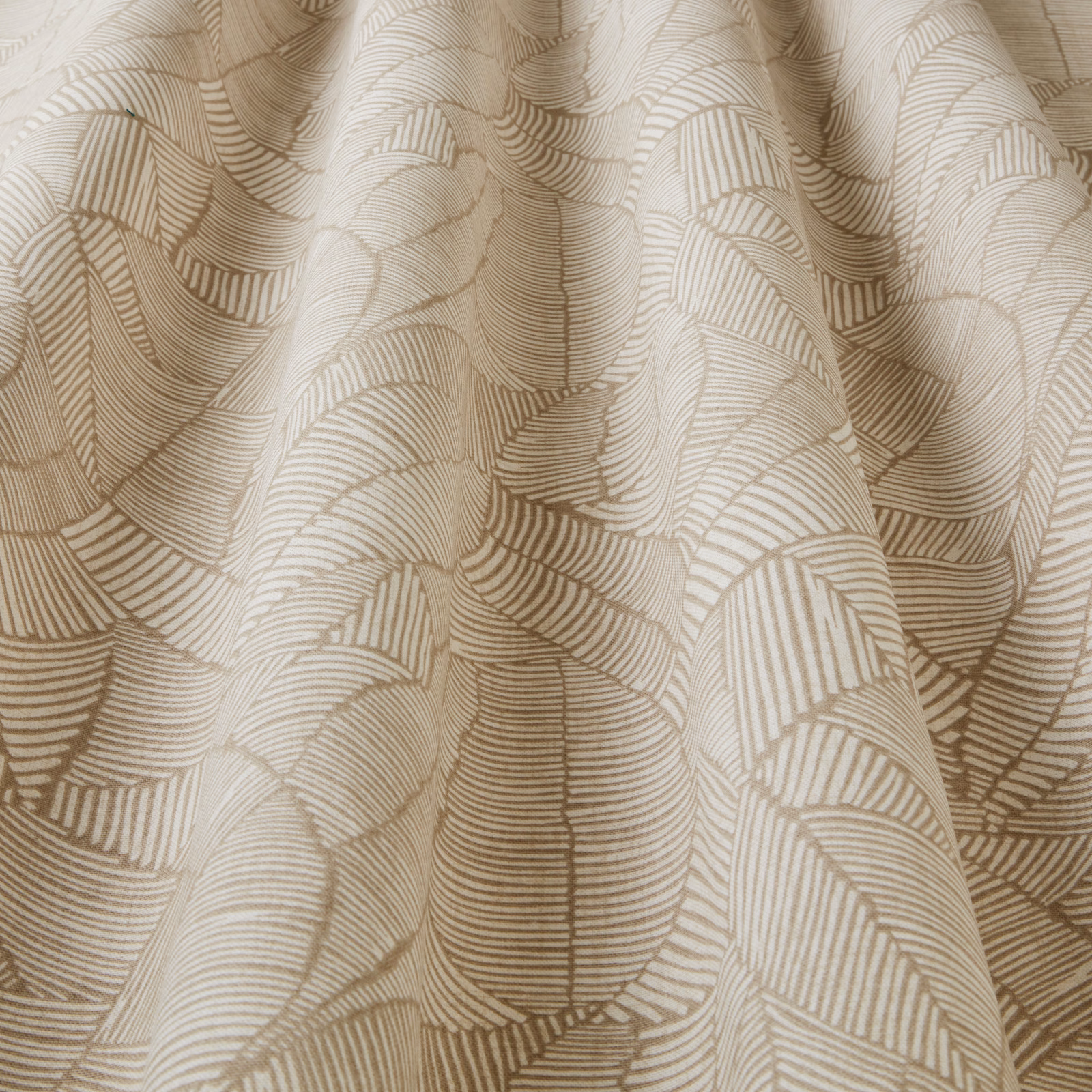 Stone-beige patterned fabric with flowing tan wave-like geometric lines
