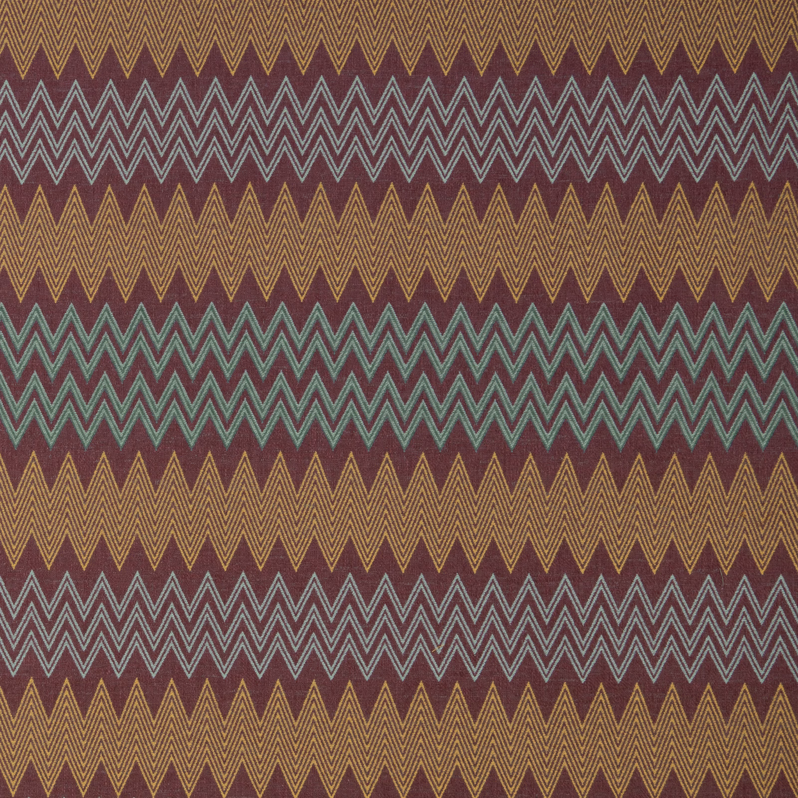 Plum geometric fabric with teal, sage and gold zigzag stripes
