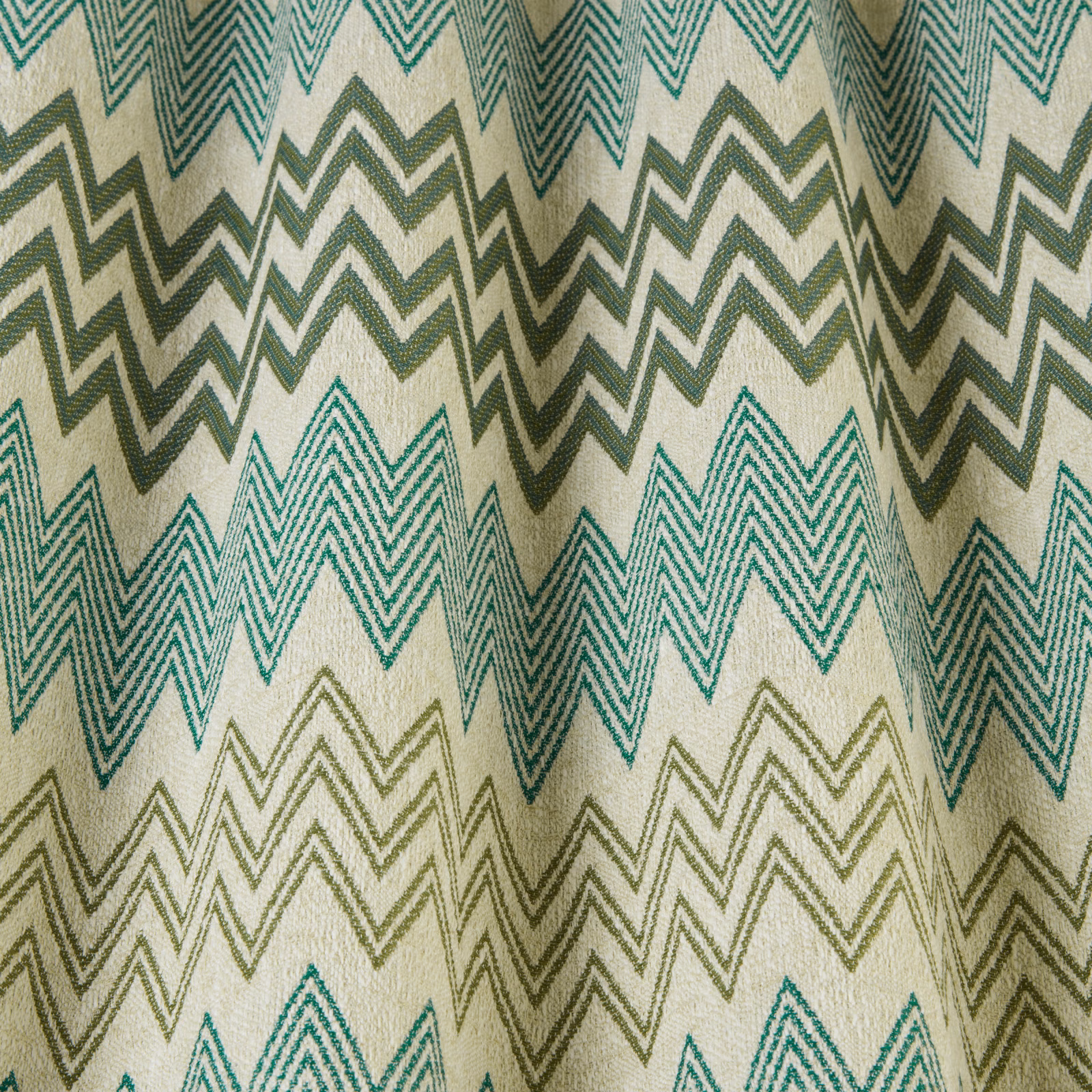 Cream fabric with layered jade, teal and olive zigzag chevrons